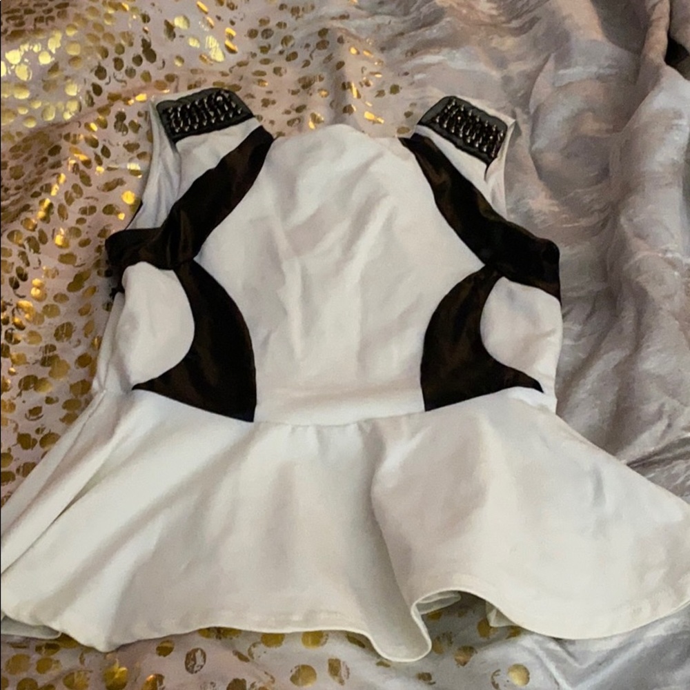 Black and white peplum top!! Bebe